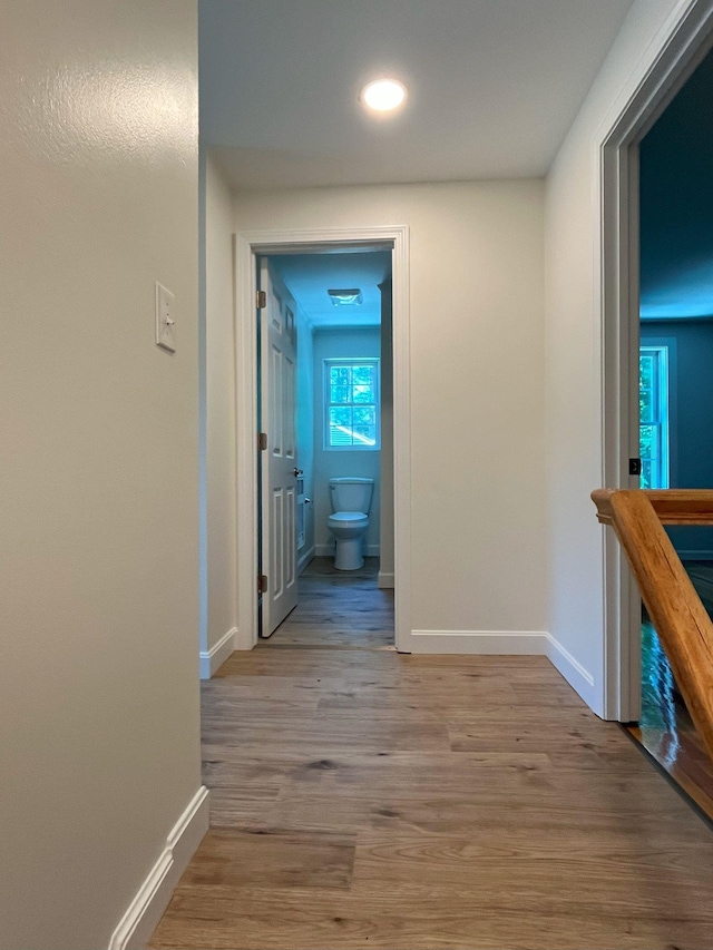 hallway featuring light hardwood / wood-style flooring