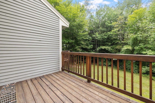 deck featuring a lawn