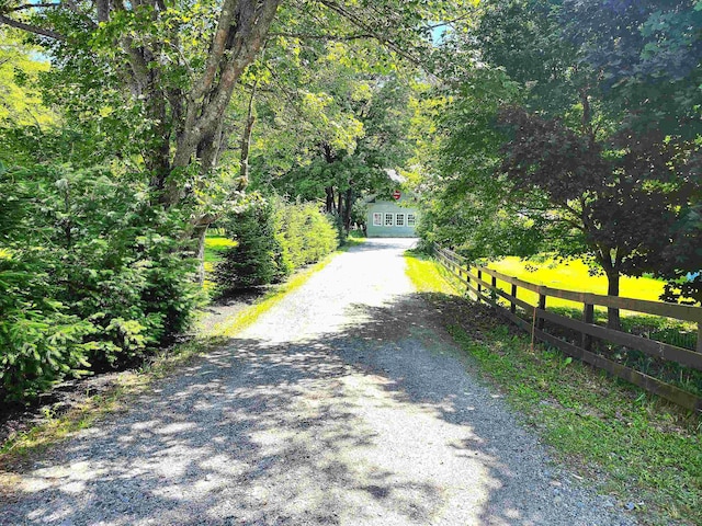 view of road with driveway