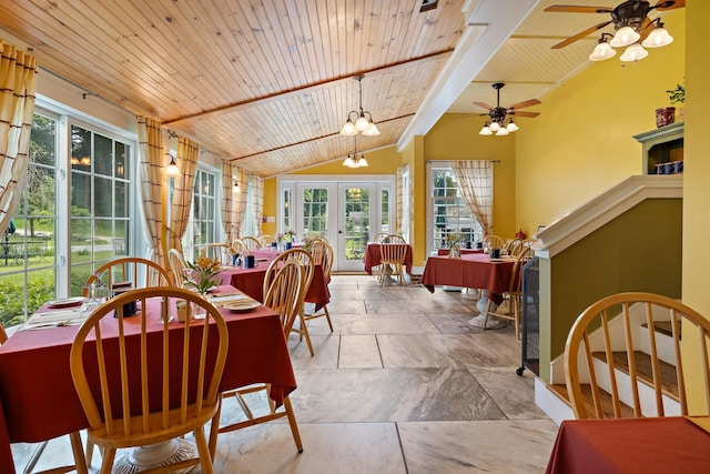 sunroom / solarium featuring vaulted ceiling, wooden ceiling, an inviting chandelier, and french doors