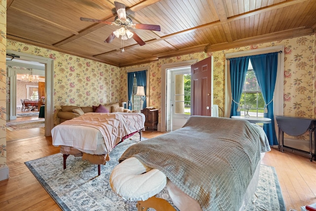 bedroom featuring crown molding, an inviting chandelier, wood ceiling, and light hardwood / wood-style floors