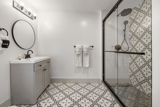 bathroom with an enclosed shower and vanity