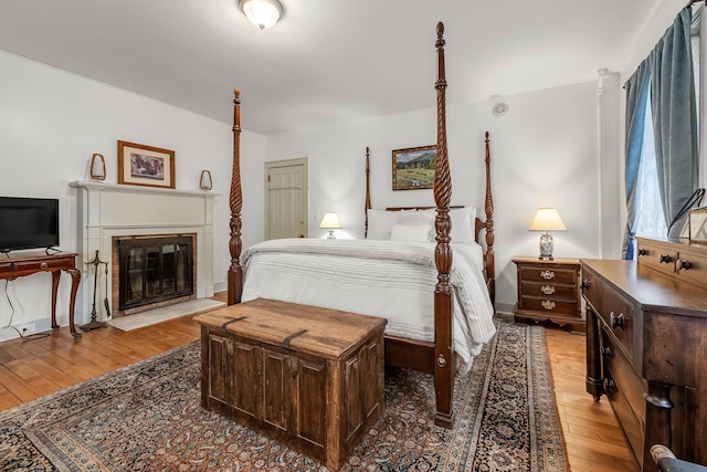 bedroom with light hardwood / wood-style flooring