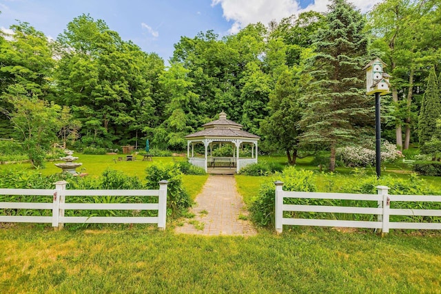 view of community with a gazebo and a lawn