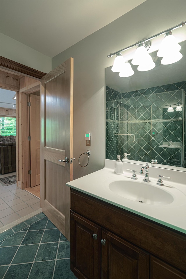 bathroom with vanity and tile patterned flooring