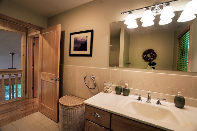 bathroom with tile patterned floors and vanity