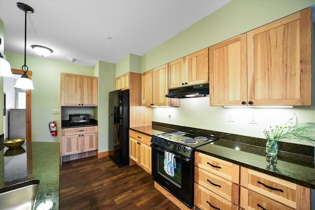 kitchen with black appliances, dark stone counters, hanging light fixtures, and dark hardwood / wood-style floors