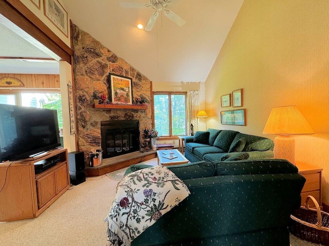 34 Sugar Brook Rd Unit F4, Peru, VT 05152 - living room featuring carpet floors, a stone fireplace, a ceiling fan, and vaulted ceiling