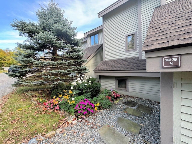 34 Sugar Brook Rd Unit F4, Peru, VT 05152 - view of side of home featuring a shingled roof