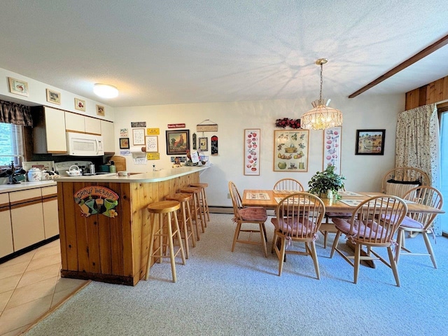 34 Sugar Brook Rd Unit F4, Peru, VT 05152 - dining space featuring a chandelier and a textured ceiling