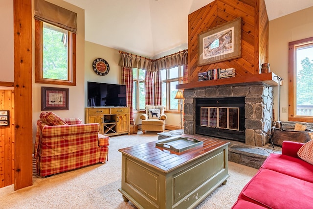 living room featuring a fireplace, carpet floors, high vaulted ceiling, and a wealth of natural light