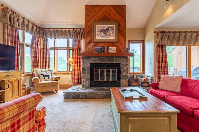 living room with a fireplace, carpet, a baseboard radiator, and vaulted ceiling