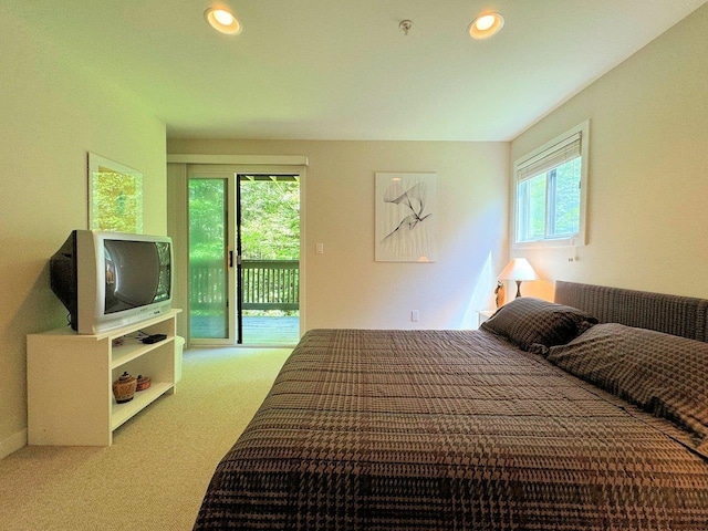 bedroom featuring carpet flooring and access to outside