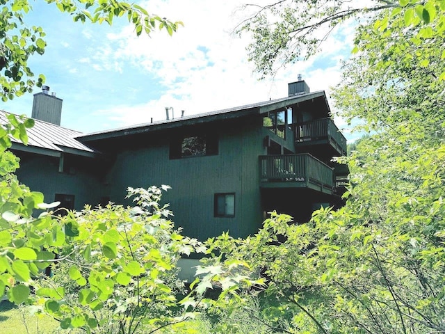 view of property exterior with a balcony