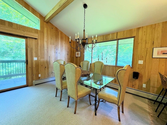 dining space featuring lofted ceiling with beams, plenty of natural light, an inviting chandelier, and baseboard heating