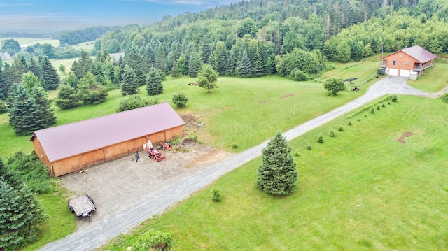 birds eye view of property featuring a rural view