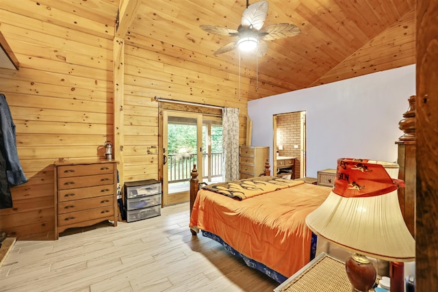 bedroom featuring access to exterior, wooden walls, high vaulted ceiling, light hardwood / wood-style floors, and wooden ceiling