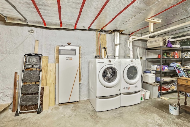 laundry room with washing machine and dryer