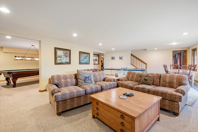 carpeted living room with pool table