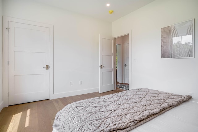 bedroom featuring light hardwood / wood-style flooring