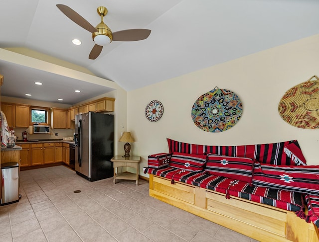 living room featuring light tile patterned floors, vaulted ceiling, a ceiling fan, and recessed lighting