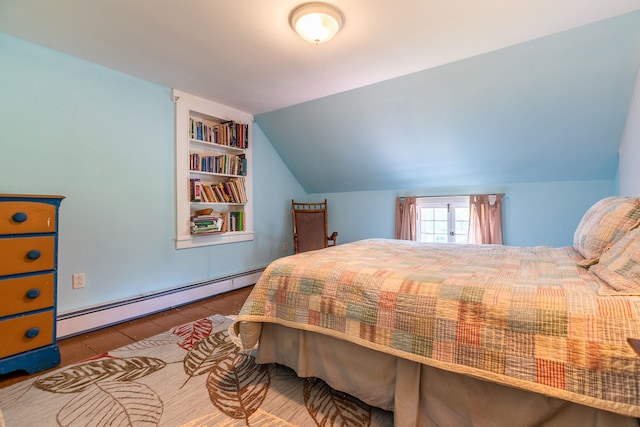 tiled bedroom with lofted ceiling and a baseboard heating unit