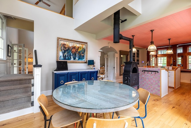 dining room featuring ceiling fan and light wood-type flooring