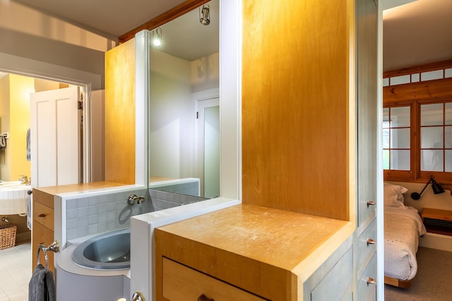 bathroom featuring tile patterned flooring