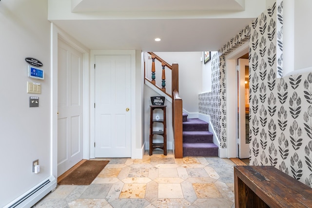 entryway with a baseboard radiator