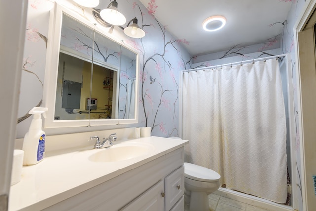 bathroom with tile patterned flooring, vanity, walk in shower, electric panel, and toilet