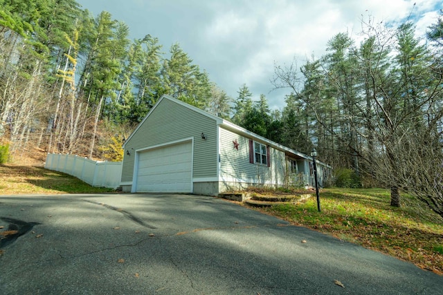 view of home's exterior with a garage