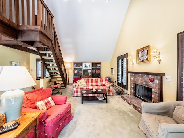 carpeted living room featuring a brick fireplace, plenty of natural light, and lofted ceiling