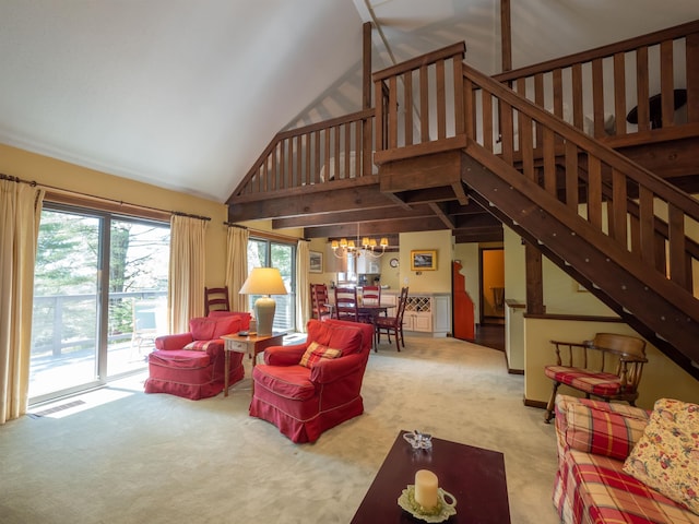 living room with light carpet, a towering ceiling, and an inviting chandelier