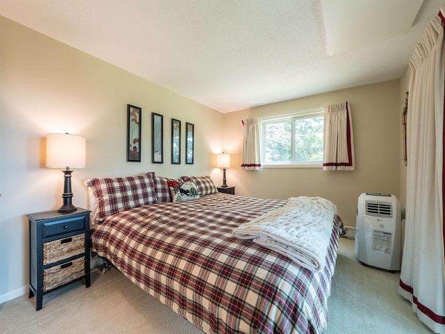 bedroom with light carpet