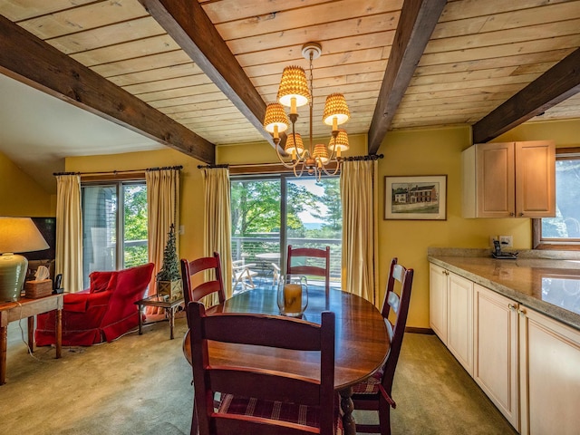 carpeted dining space featuring beamed ceiling, a chandelier, and wooden ceiling