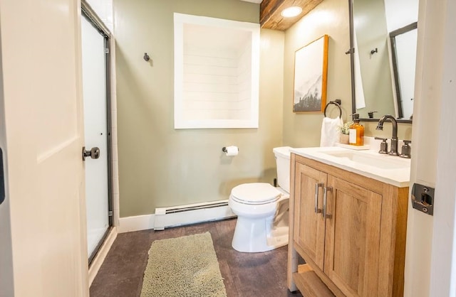 bathroom with an enclosed shower, toilet, vanity, a baseboard radiator, and hardwood / wood-style flooring