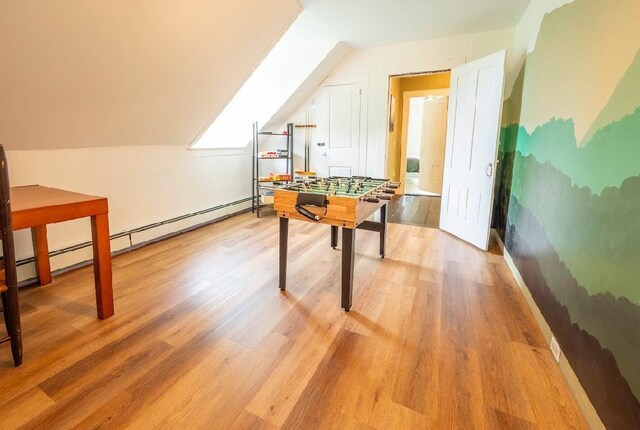 living room with hardwood / wood-style flooring and built in shelves