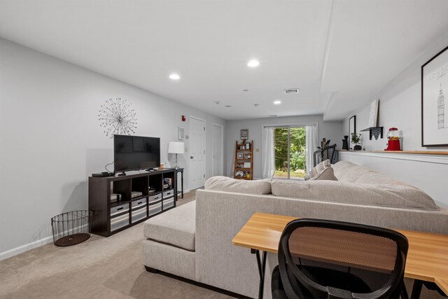 living room featuring light colored carpet
