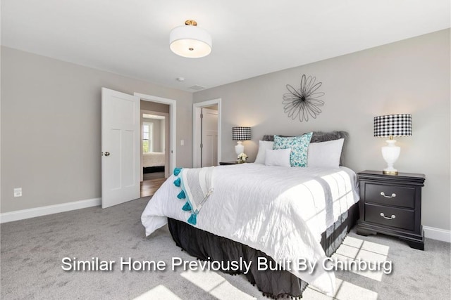 bedroom featuring light colored carpet