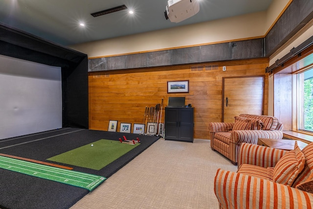 recreation room featuring carpet, wood walls, and golf simulator