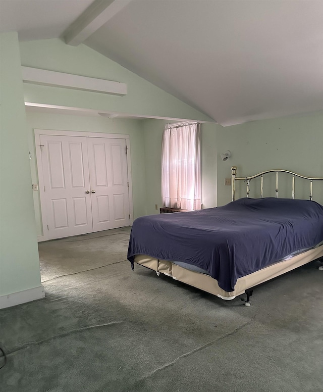 carpeted bedroom featuring lofted ceiling with beams and a closet