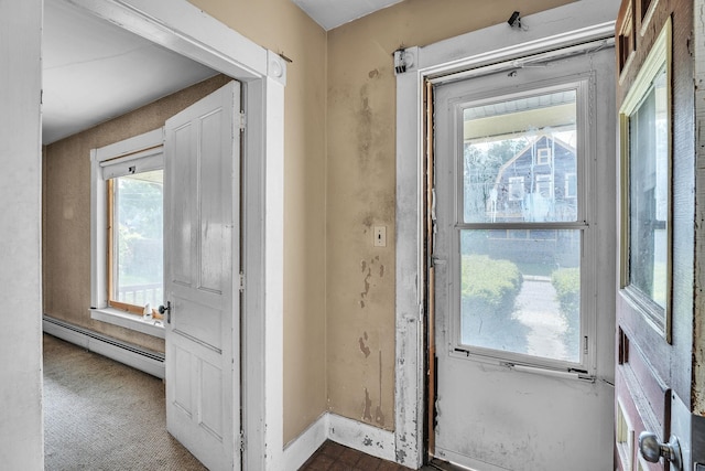 entryway featuring baseboard heating