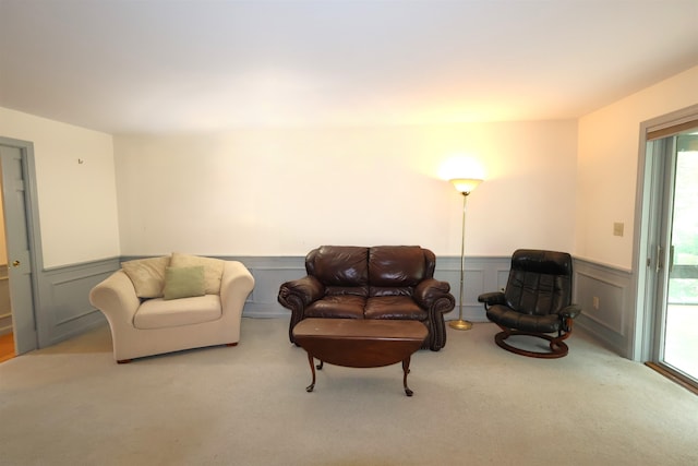 living room with light carpet and a wealth of natural light