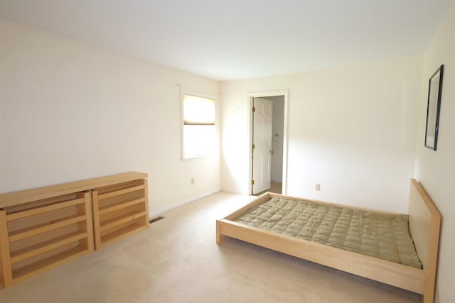 unfurnished bedroom featuring carpet