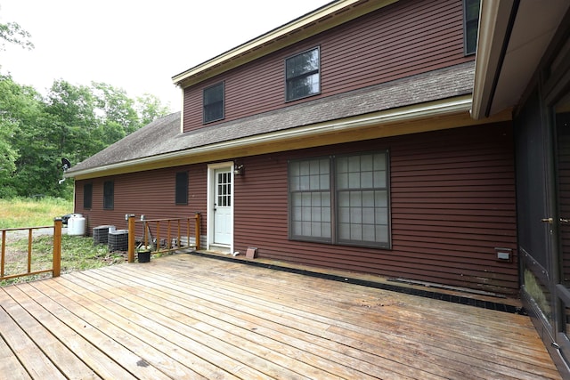 wooden terrace with central air condition unit