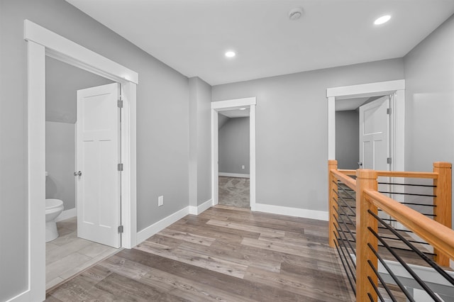 corridor featuring light hardwood / wood-style flooring