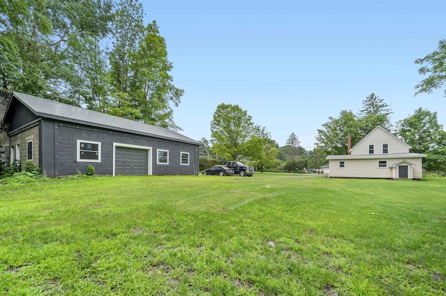 view of yard featuring a garage