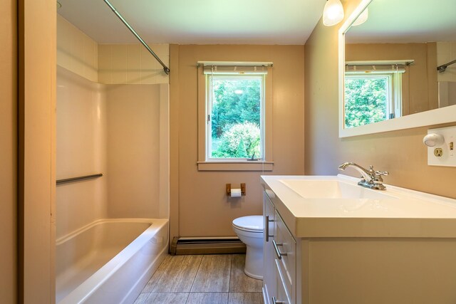 bonus room featuring a textured ceiling, vaulted ceiling, a baseboard heating unit, and a wealth of natural light