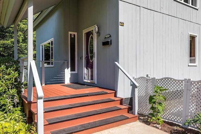 doorway to property featuring a wooden deck