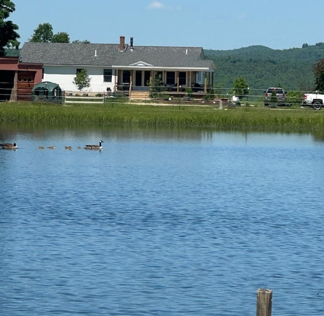 property view of water featuring a mountain view